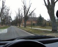 На подъезде к месту КПП, виден первый дом городка, 2006